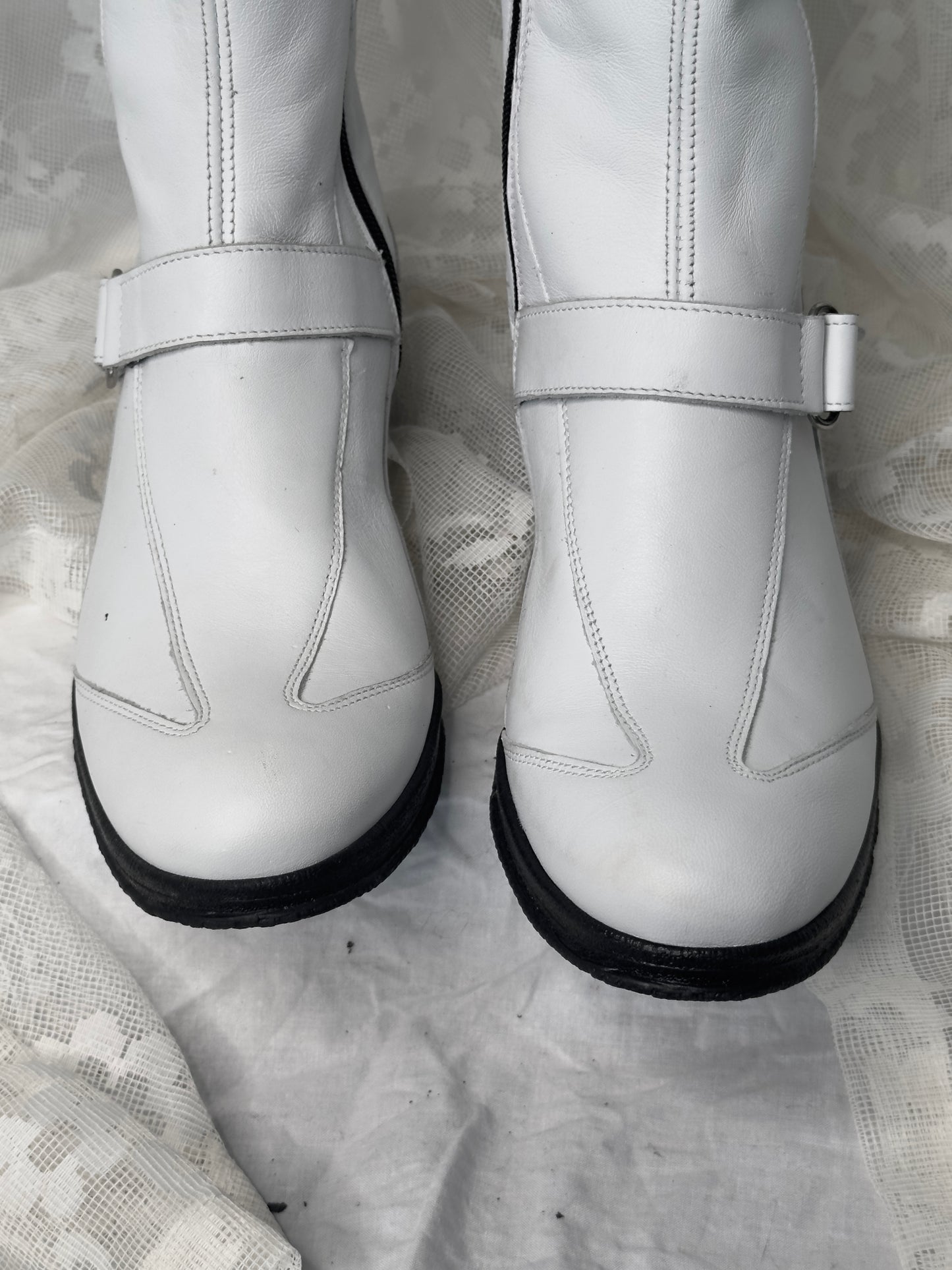 + Futuristic leather boots +