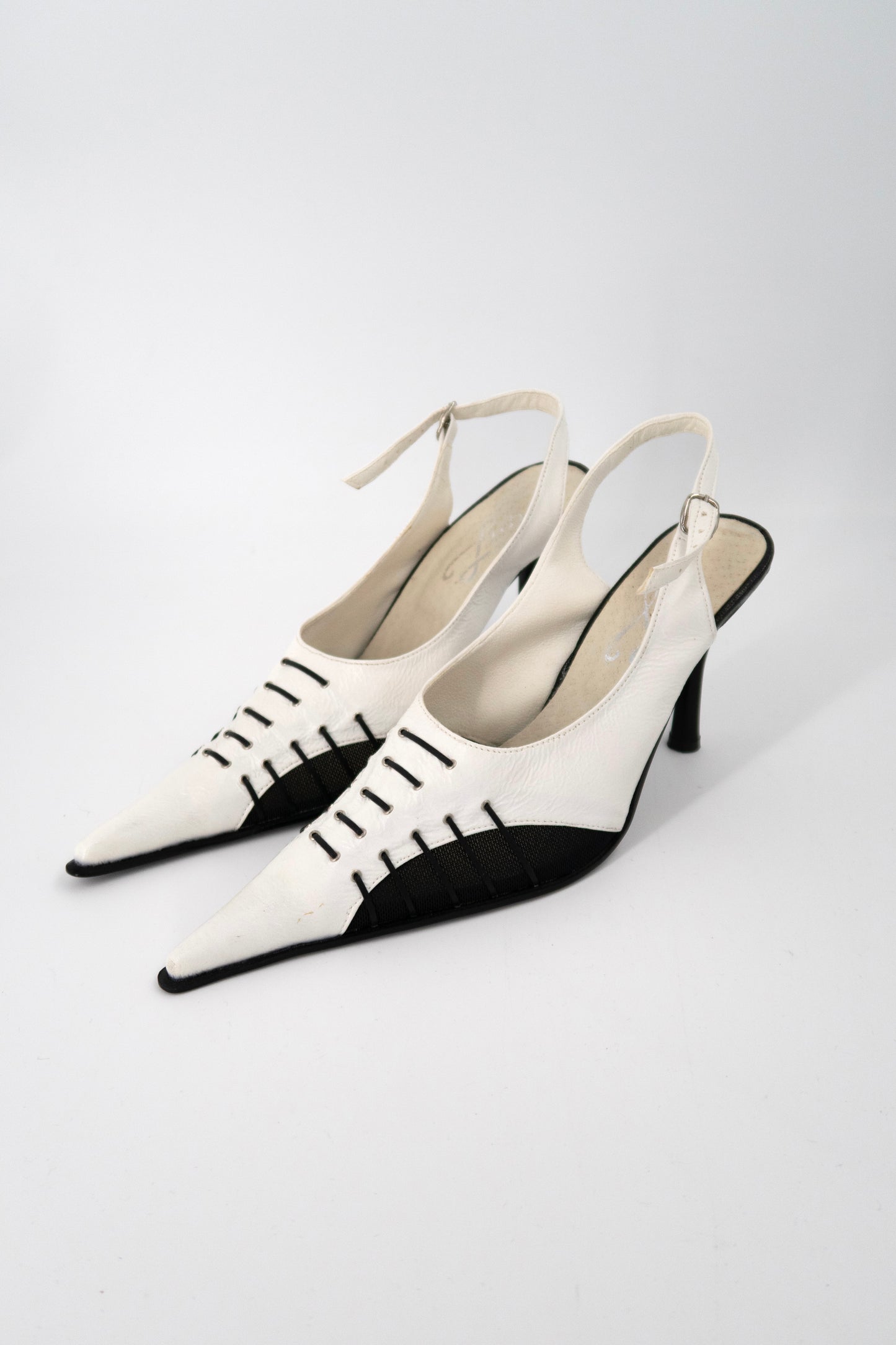 + Sporty pointed heels +