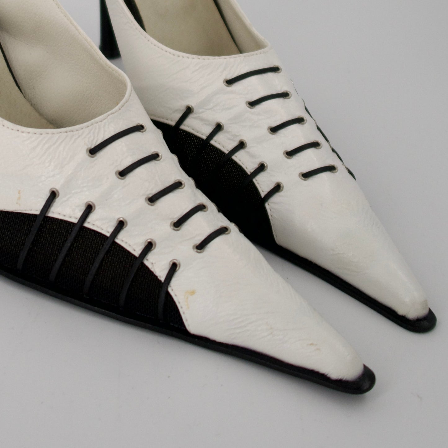 + Sporty pointed heels +