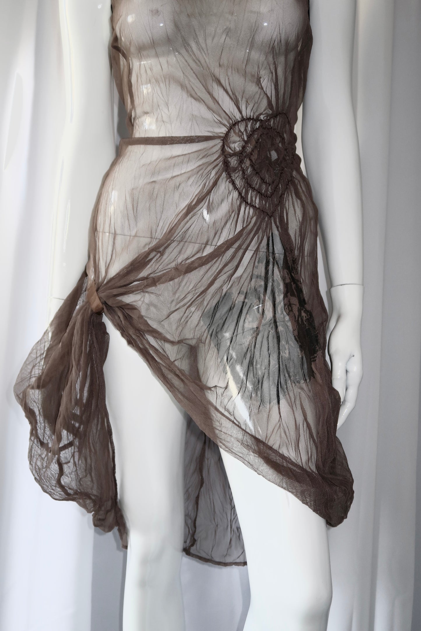 + Asymmetrical mesh tunic +