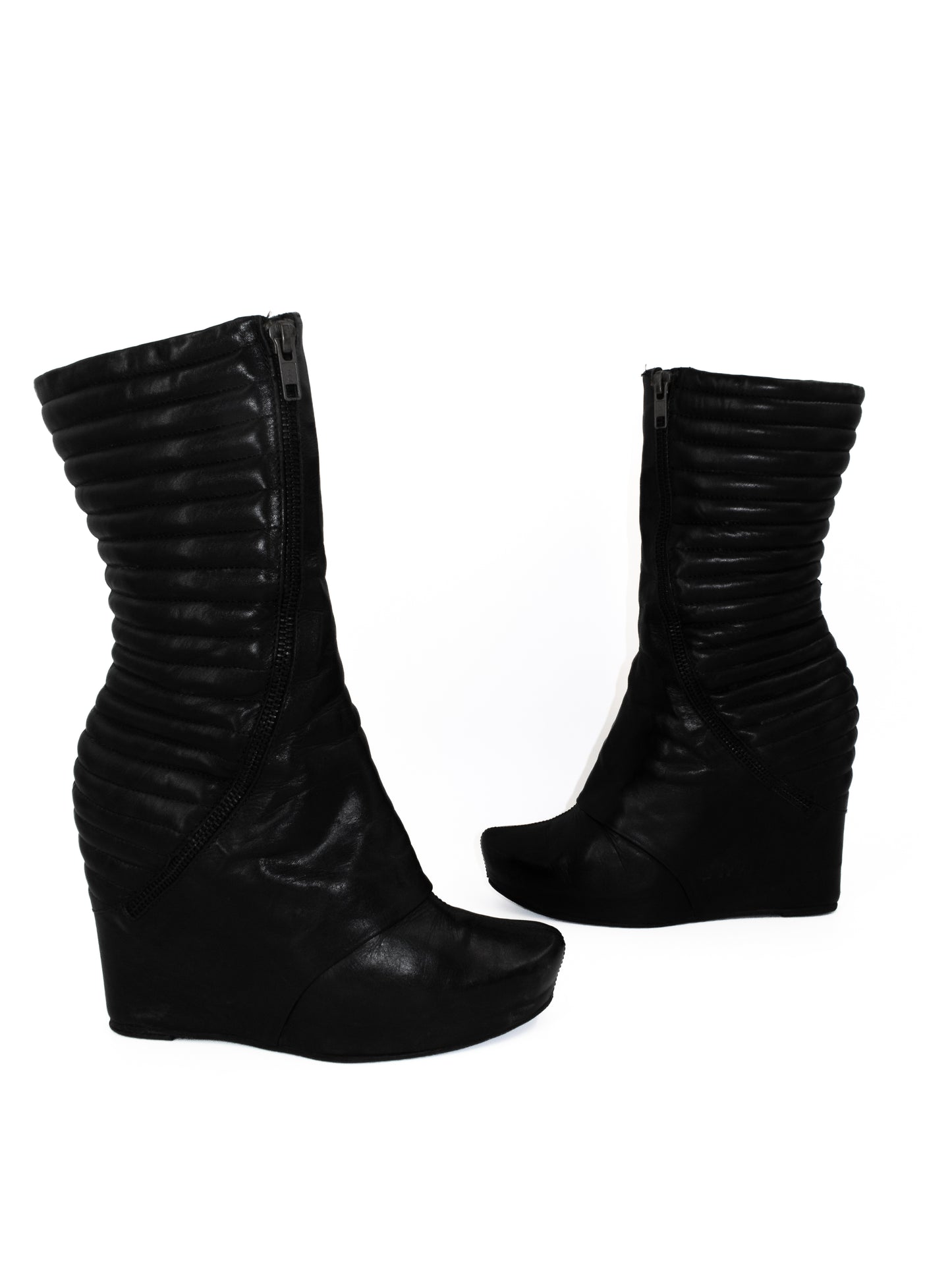 + Vintage leather wedge boots +