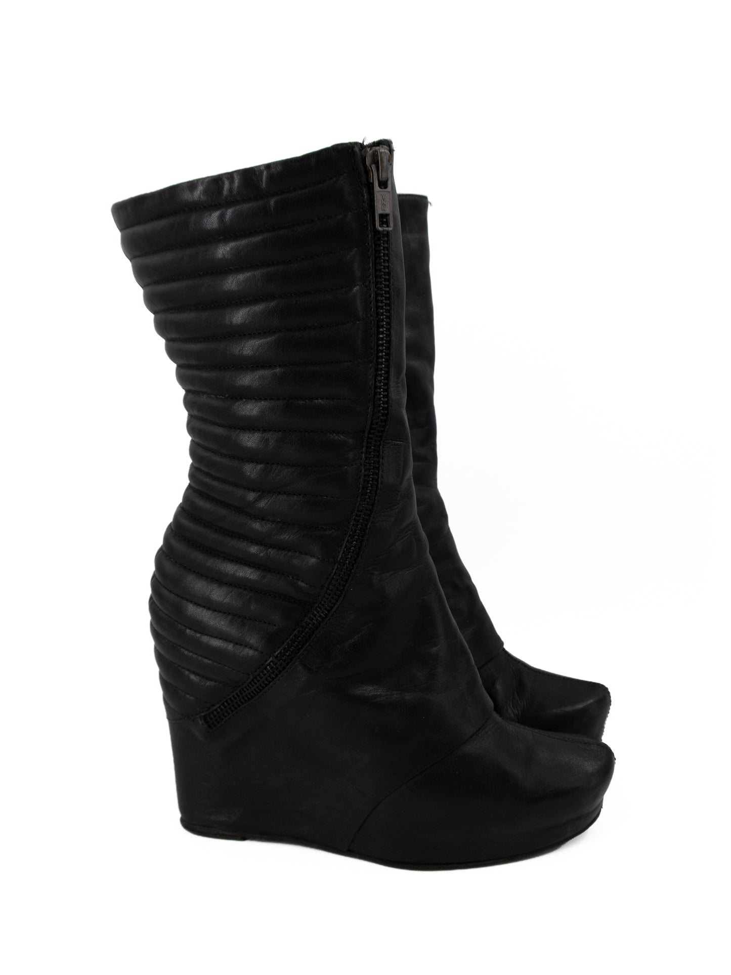 + Vintage leather wedge boots +