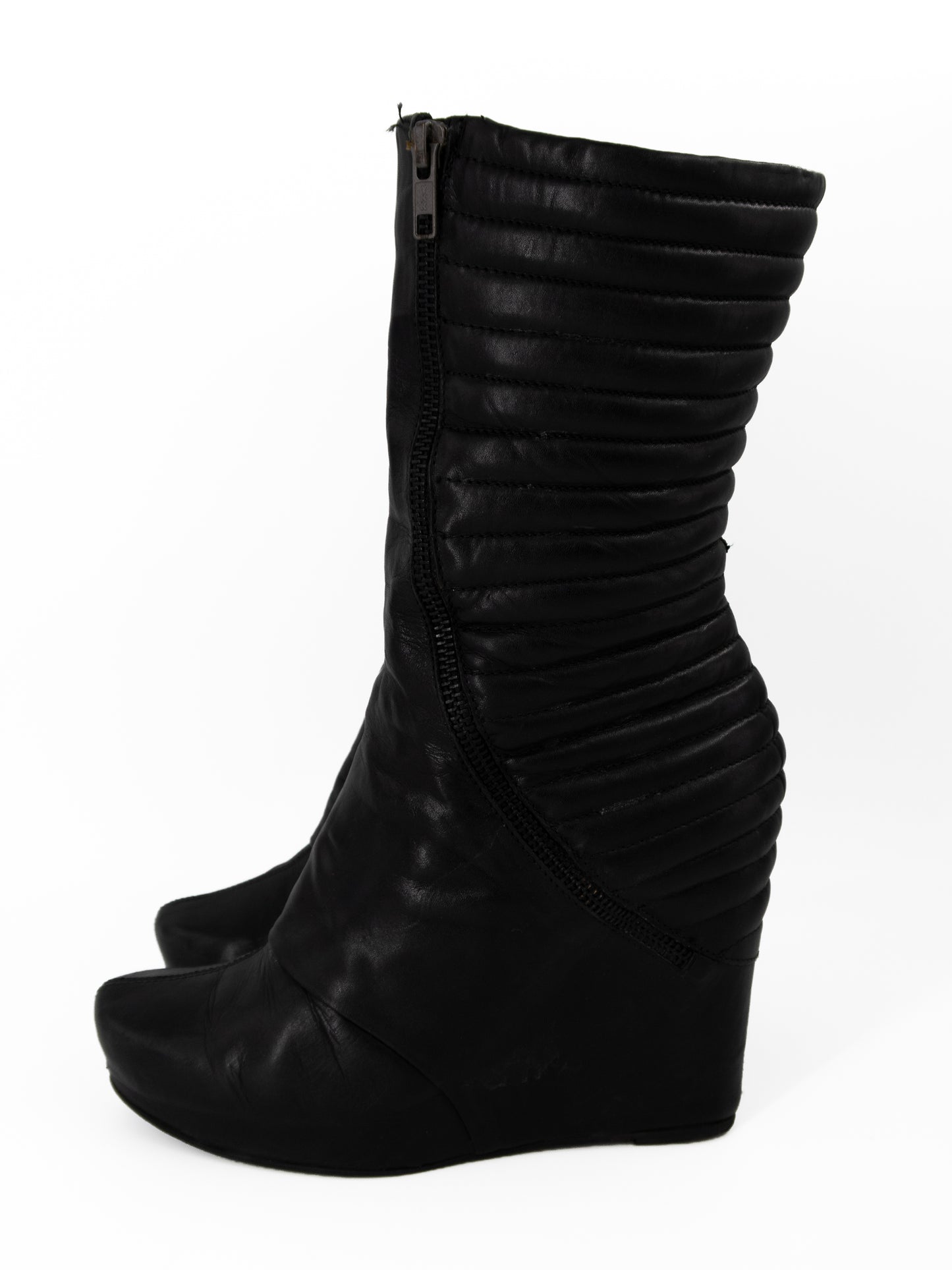+ Vintage leather wedge boots +