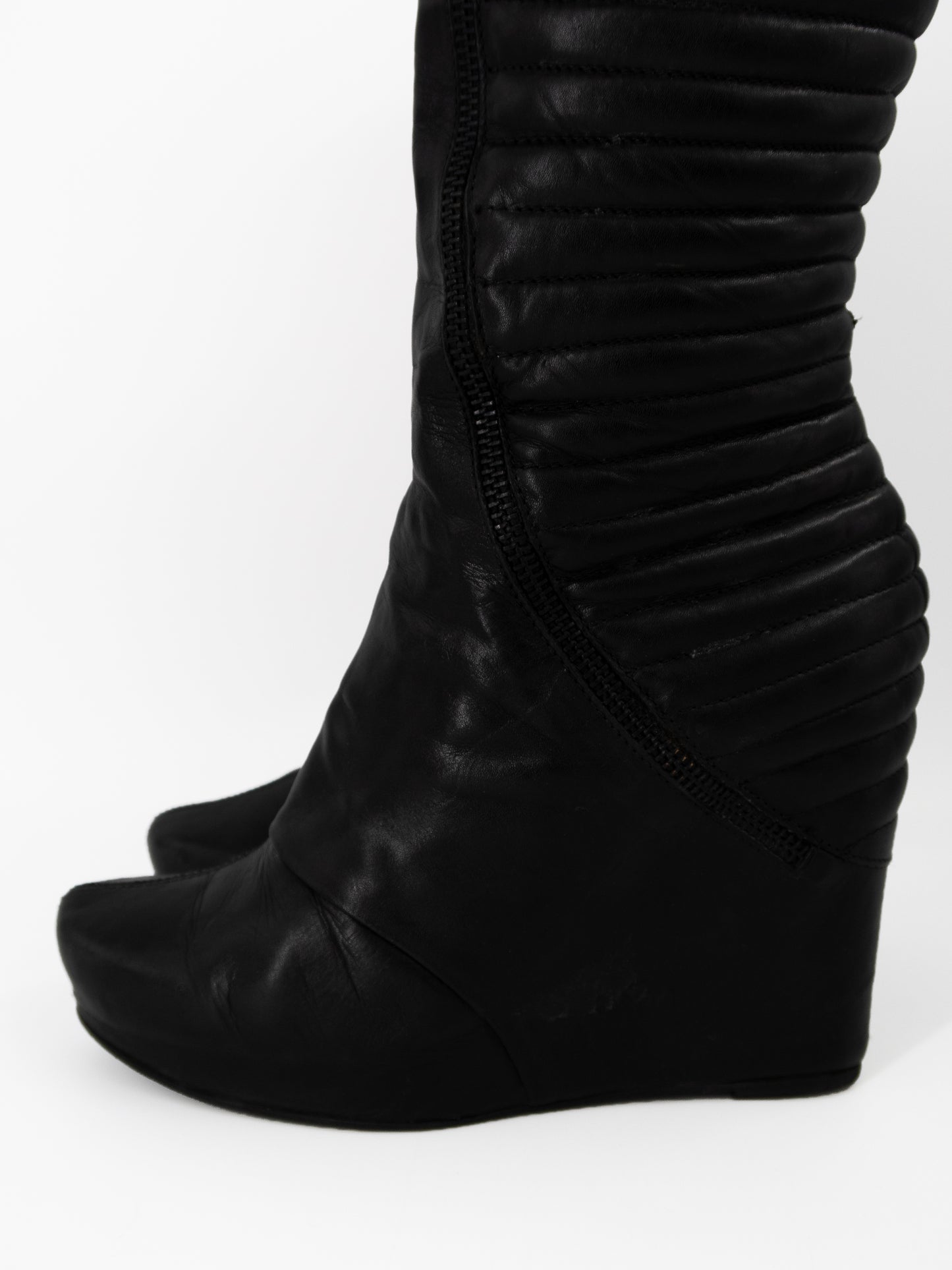 + Vintage leather wedge boots +