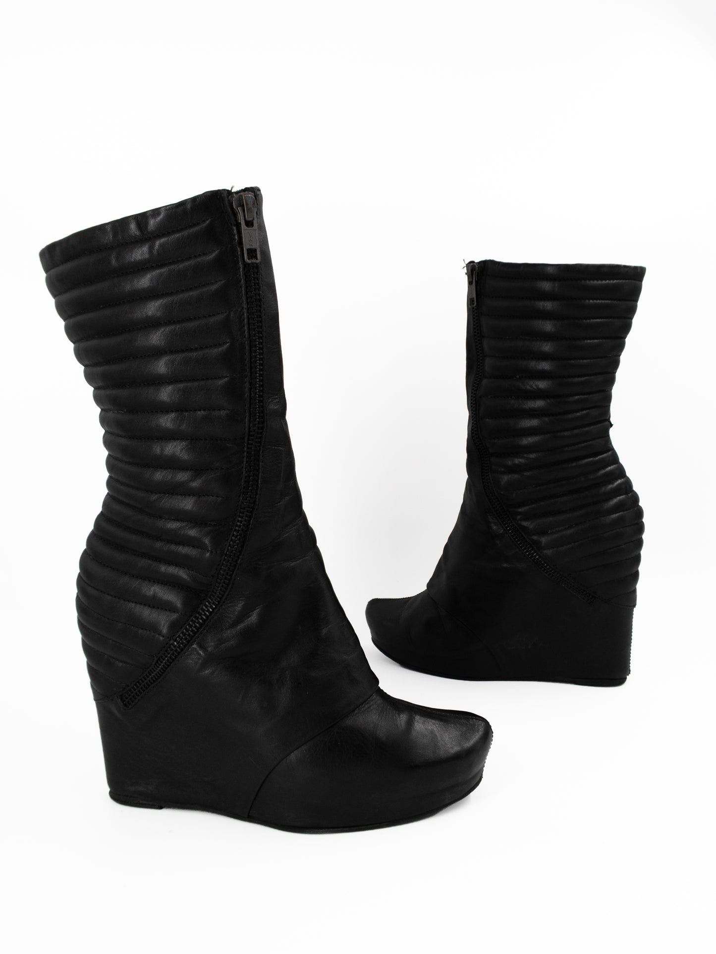 + Vintage leather wedge boots +